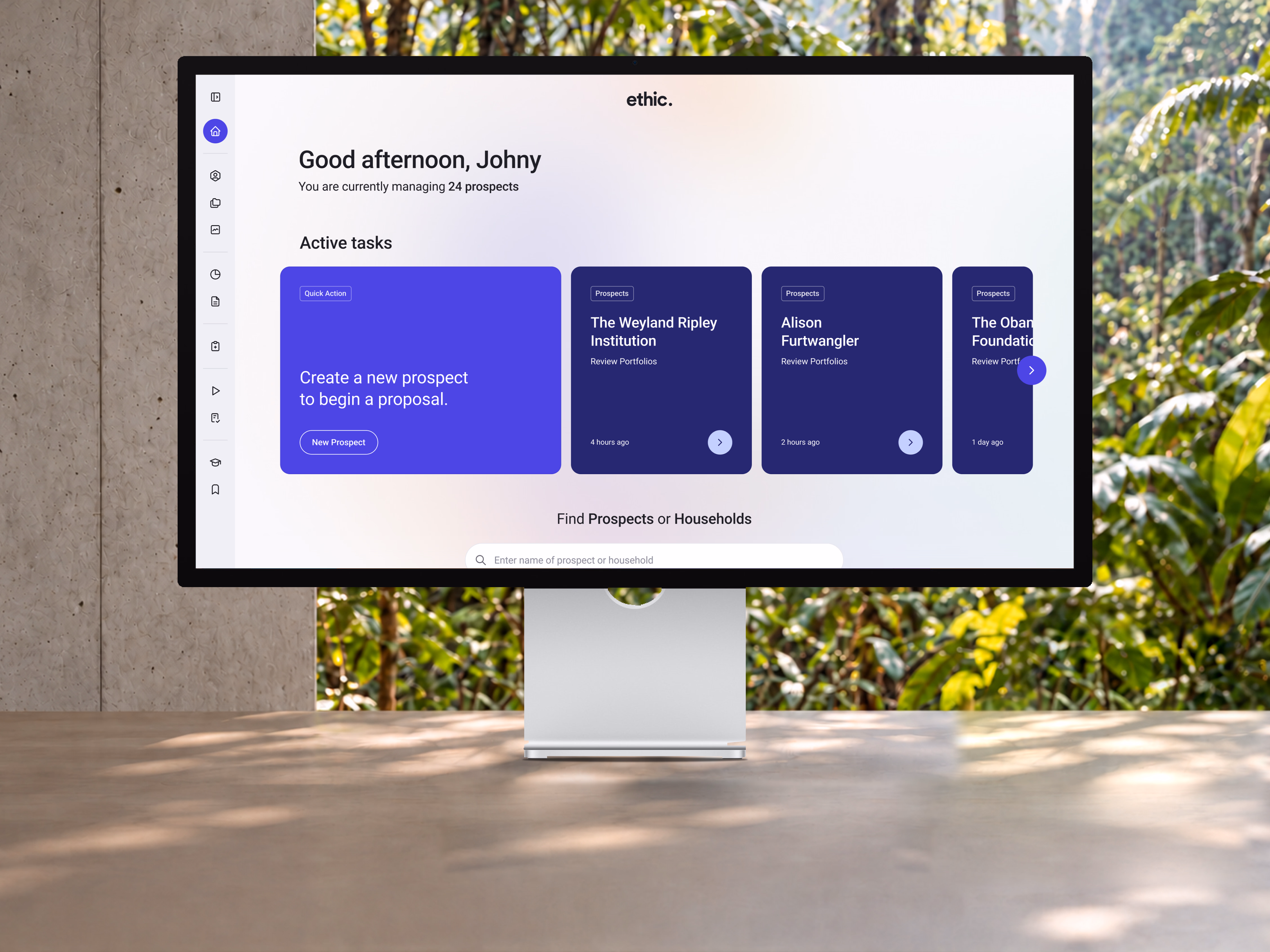 Ethic's advisor dashboard on a desktop display on a clean desk overlooking dense Hawaiian rainforest, in daylight.